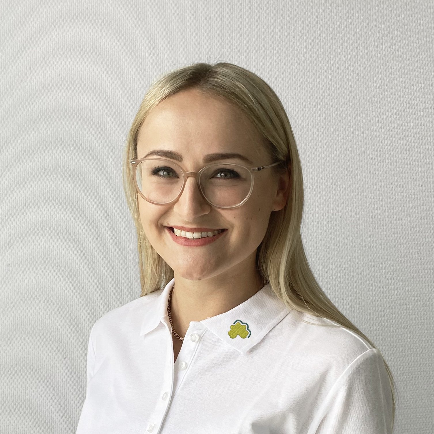 Portraitfoto von Anna-Lena Muesel, Mitarbeiterin Personal- Organisationsentwikcklung