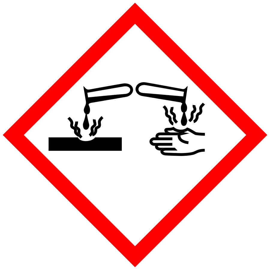 Rotumrandetes Quadrat mit Chemikalie die Verbrennung/Verätzung auf Stoffen und Händen verursacht.